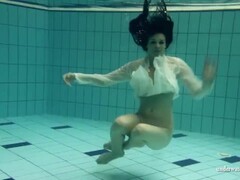 Nude teen babe alone in swimming pool Thumb
