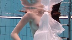 Dark pool vibes with white dress fun girl Thumb