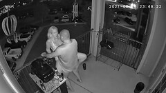 Couple caught on the balcony Thumb