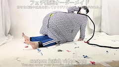 a giant balloon inside a pregnant woman'_s maternity wear. Thumb